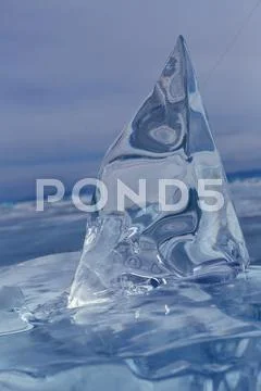 Beautiful transparent block of ice ~ Premium Photo #62056589