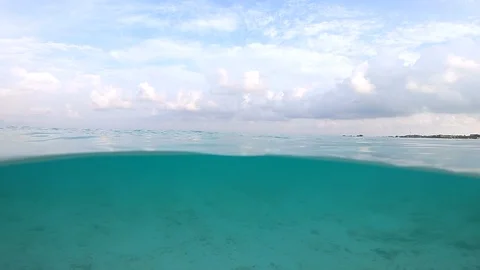 A beautiful tropical beach, half under water - half above water. Stock Footage
