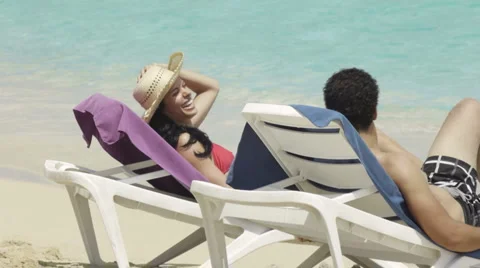 Beautiful tropical beach with happy married couple on vacations Stock Footage