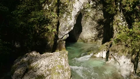 Beautiful Turquoise, Emerald River Floating Out of Big Gorge. Stock Footage 168497955