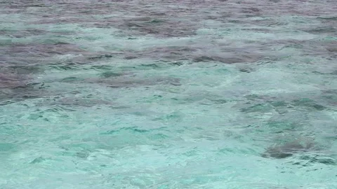 Beautiful turquoise ocean waves close up seamless loop Stock Footage 218011055