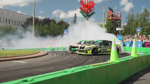 Beautiful Twin Drift. Old and new generation BMW in twin drift. Stock Footage 312455137