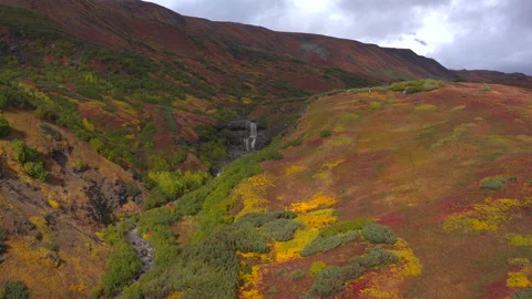 A beautiful two-stage waterfall. Stunning autumn landscape Stock-Footage 142931345