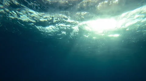 Beautiful underwater sea view with natural light rays in slow motion Stock Footage