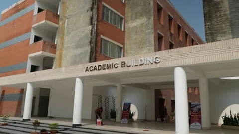 A beautiful university complex surrounded by trees Stock Footage 164896573