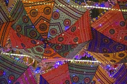 Beautiful upside-down patterned umbrellas in a cafe Stock Photos