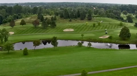 Beautiful urban golf course viewed from above Stock Footage