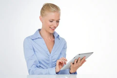 Beautiful using notepad at office Stock Photos