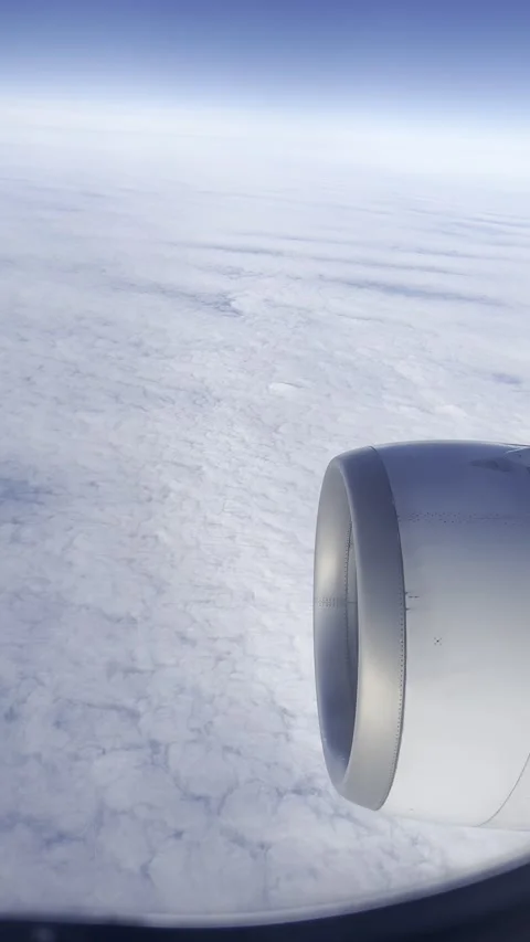 Beautiful veil of clouds under the wing of an airplane Stock Footage 237762000
