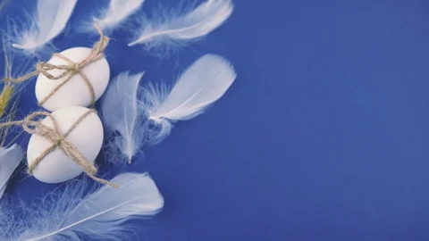 Beautiful video with Easter eggs on a blue background. Stock Footage