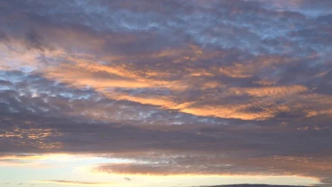 Beautiful video time lapse of dramatic colourful sunset sky. Stock Footage 129907386