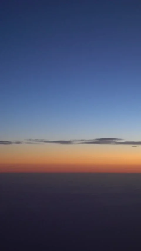 Beautiful View Of Aerial Clouds Through An Airplane Window In Dawn Sun Stock Footage 332066121