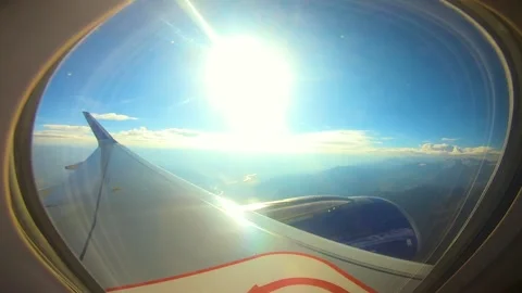 Beautiful view of airplane window overlooking city of India Stock Footage 293403066
