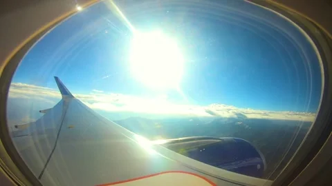 Beautiful view of airplane window overlooking city of India Stock Footage 293403134