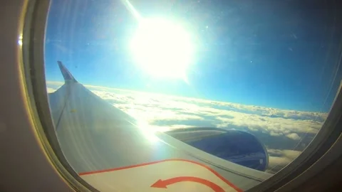 Beautiful view of airplane window overlooking city of India Stock Footage 293403760