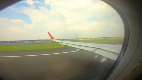 Beautiful view of airplane window overlooking city of India Stock Footage 293406001