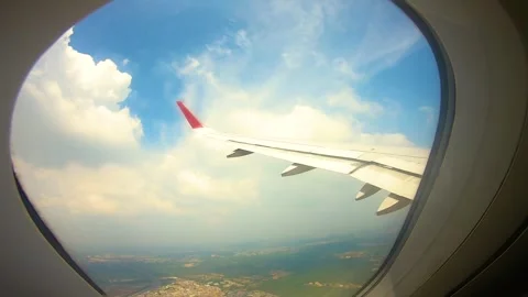 Beautiful view of airplane window overlooking city of India Stock Footage 293406062