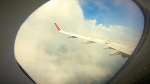 Beautiful view of airplane window overlooking city of India Stock Footage 293406219