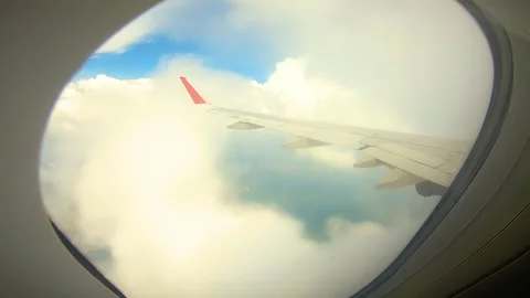 Beautiful view of airplane window overlooking city of India Stock Footage 293406254