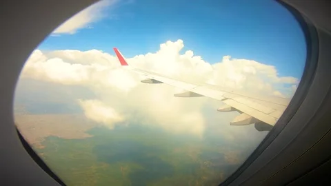 Beautiful view of airplane window overlooking city of India Stock Footage 293406290