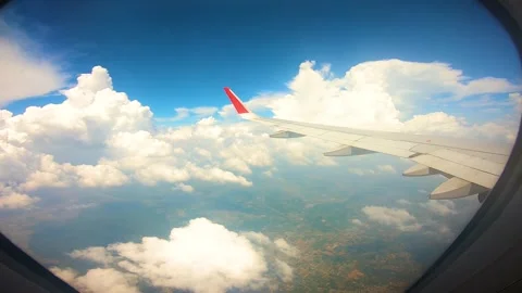 Beautiful view of airplane window overlooking city of India Stock Footage 293406460