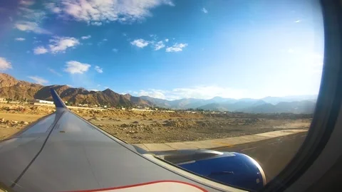Beautiful view of airplane window overlooking city of India Stock Footage 293406518