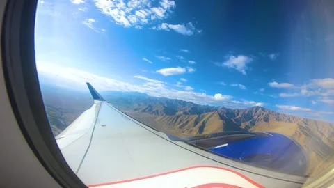 Beautiful view of airplane window overlooking city of India Stock Footage 293408295