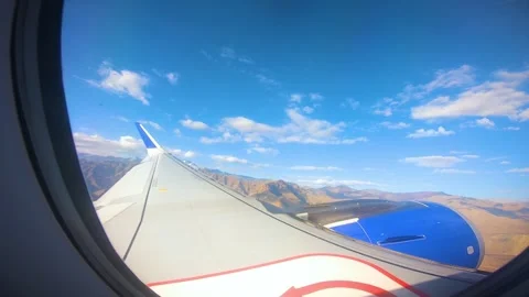 Beautiful view of airplane window overlooking city of India Stock Footage 293408323
