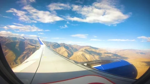 Beautiful view of airplane window overlooking city of India Stock Footage 293409368