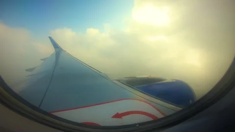 Beautiful view of airplane window overlooking city of India Stock Footage 293411135