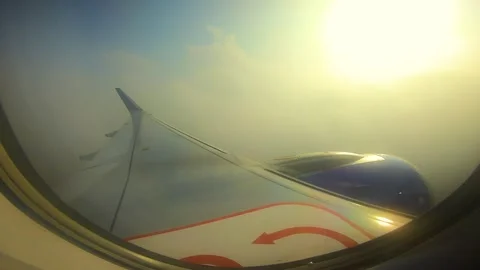 Beautiful view of airplane window overlooking city of India Stock Footage 293411205