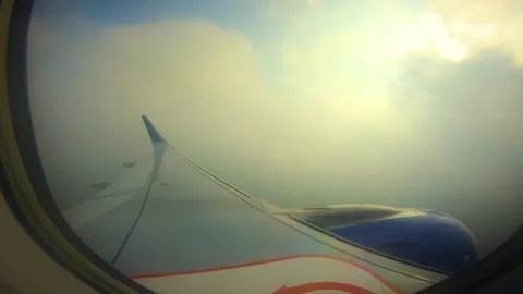 Beautiful view of airplane window overlooking city of India Stock Footage 293411213