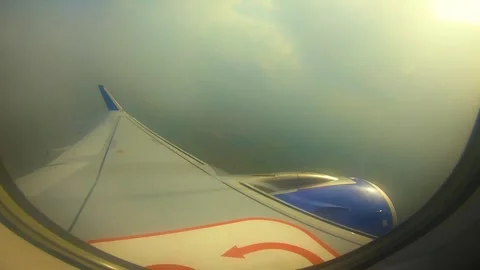 Beautiful view of airplane window overlooking city of India Stock Footage 293411254