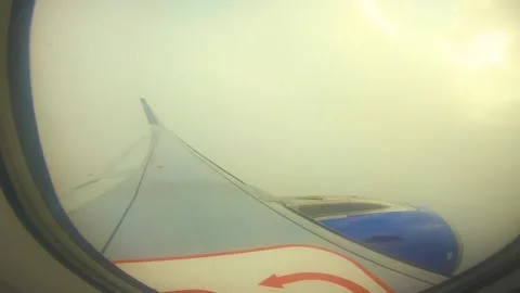 Beautiful view of airplane window overlooking city of India Stock Footage 293411260