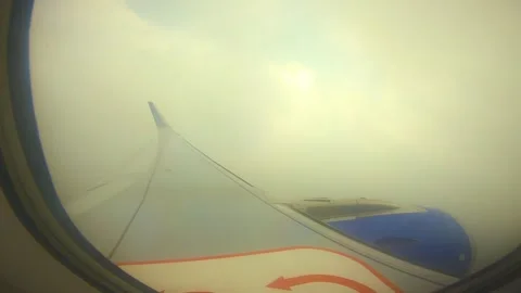 Beautiful view of airplane window overlooking city of India Stock Footage 293411281