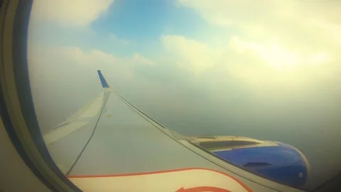 Beautiful view of airplane window overlooking city of India Stock Footage 293411331