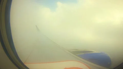 Beautiful view of airplane window overlooking city of India Stock Footage 293411334