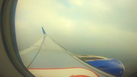 Beautiful view of airplane window overlooking city of India Stock Footage 293411352