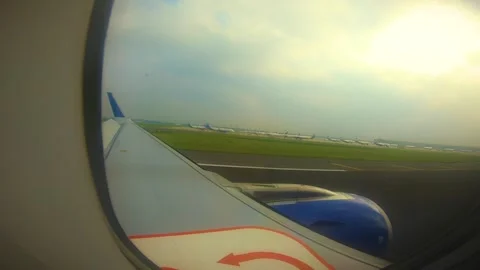 Beautiful view of airplane window overlooking city of India Stock Footage 293411568