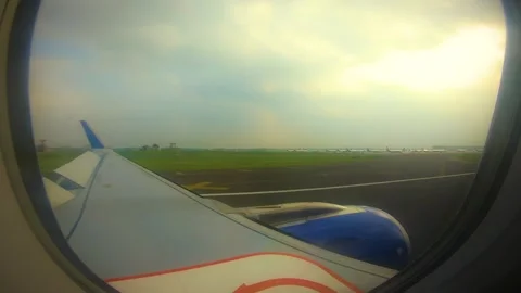 Beautiful view of airplane window overlooking city of India Stock Footage 293411569