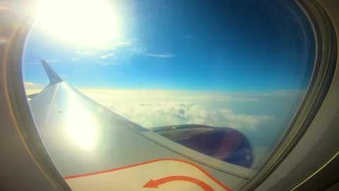 Beautiful view of airplane window overlooking city of India Stock Footage 293411641