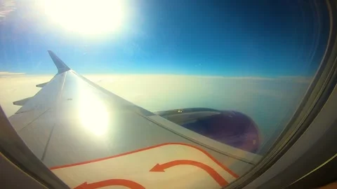 Beautiful view of airplane window overlooking city of India Stock Footage 293411749