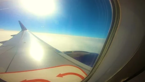 Beautiful view of airplane window overlooking city of India Stock Footage 293411842