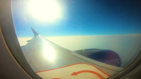 Beautiful view of airplane window overlooking city of India Stock Footage 293411859