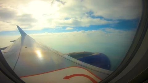 Beautiful view of airplane window overlooking city of India Stock Footage 293412011