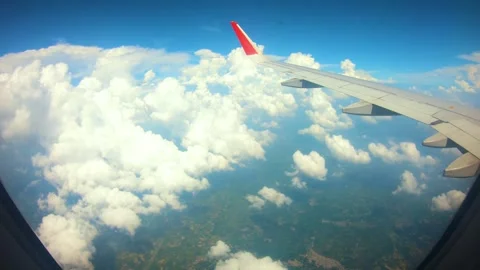 Beautiful view of airplane window overlooking city of India Stock Footage 293412174