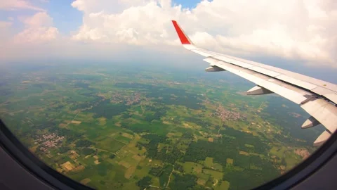 Beautiful view of airplane window overlooking city of India Stock Footage 293412216
