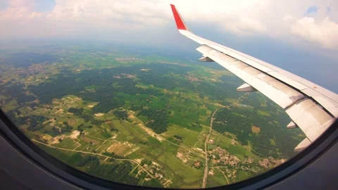 Beautiful view of airplane window overlooking city of India Stock Footage 293412261