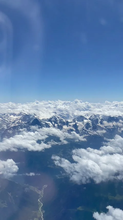 Beautiful view from an airplane window to Swiss Alps Video stock 330608751