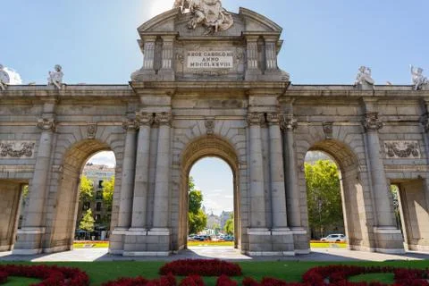 Beautiful view of Alcala gate empty in Madrid Spain during sunny day Stock Photos
